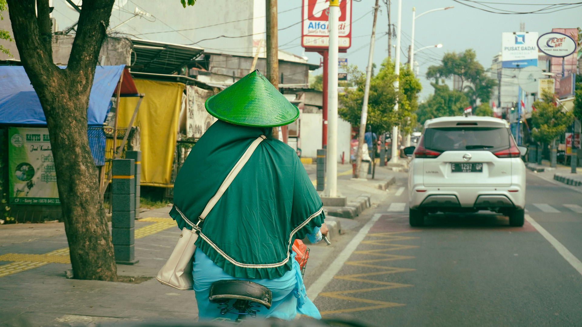 A person riding a bike in a city