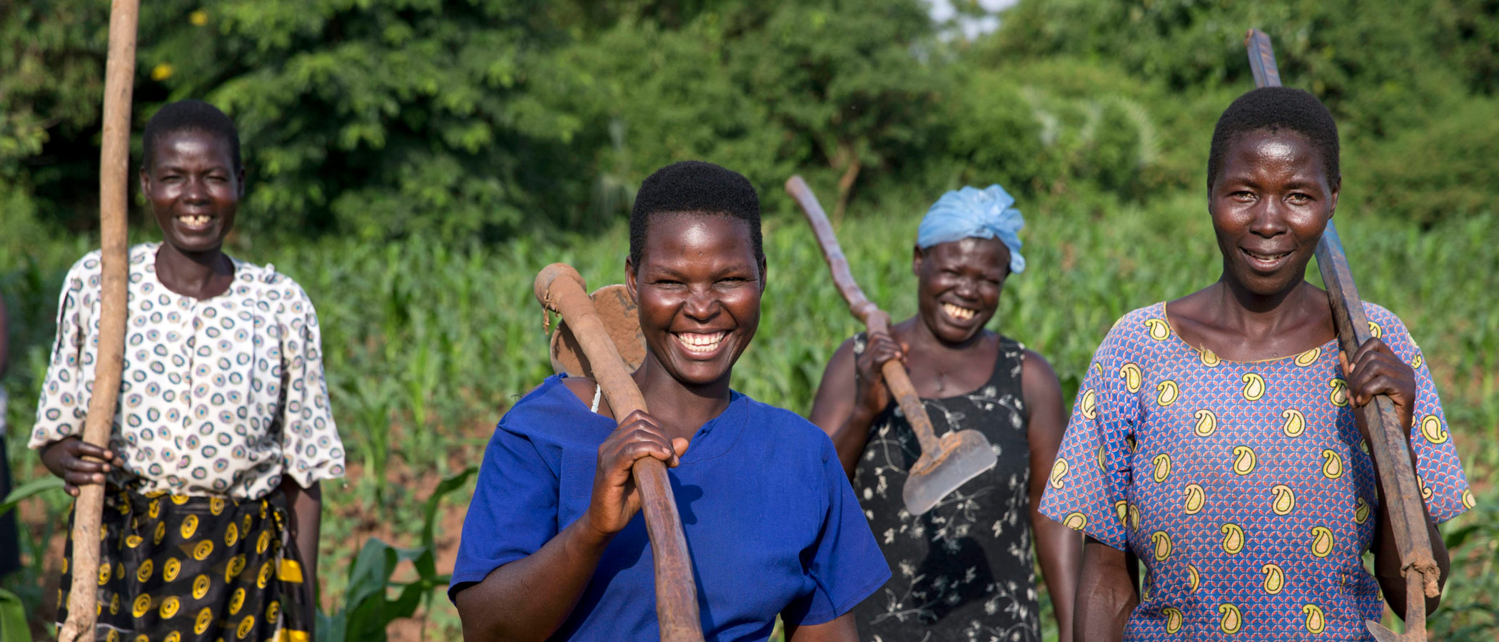 Women standing together smiling