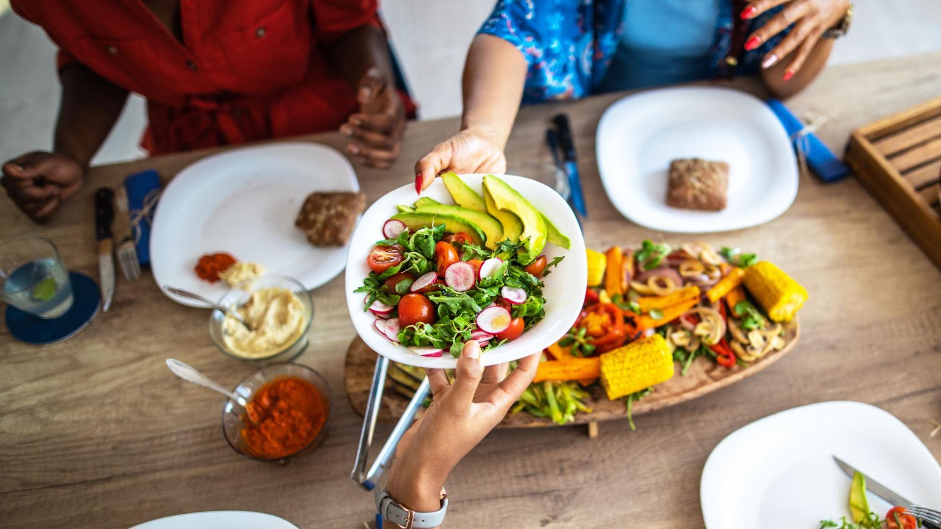 Serving food at a table