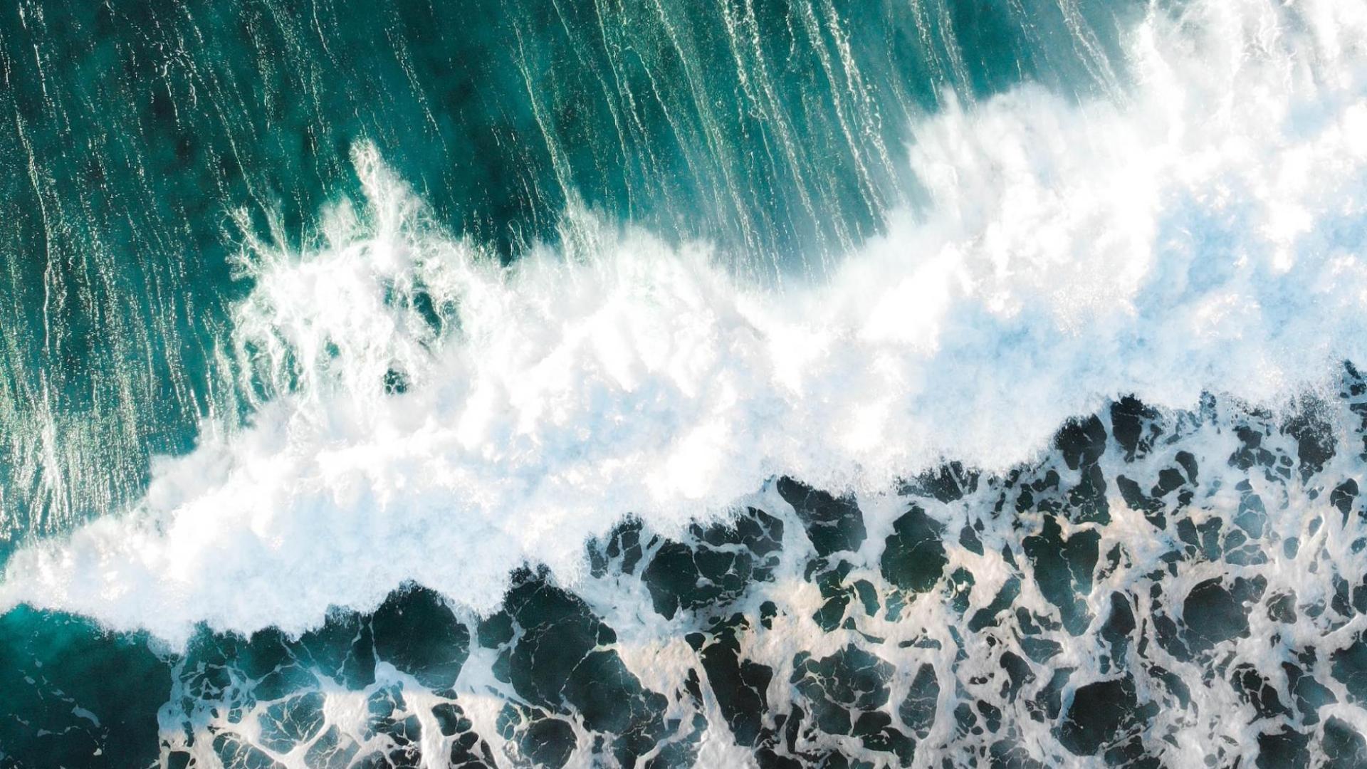 waves crashing onshore